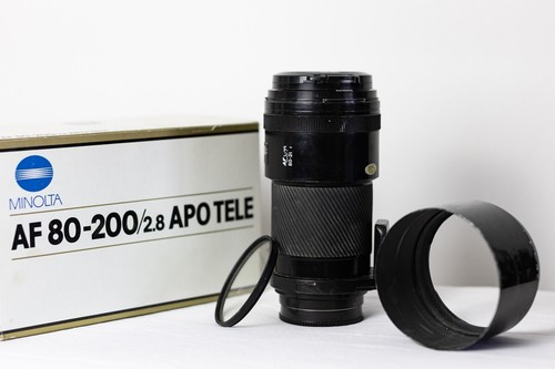 Minolta 200 mm - af, a)